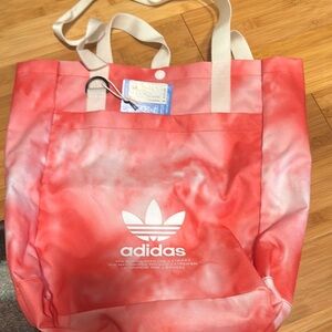 Adidas Red and White Satchel with Spacious Design